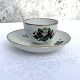 Royal 
Copenhagen, Old 
chocolate cup 
with violets, 
7cm in 
diameter, 4.5cm 
high *With wear 
on the ...