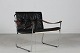 Danish ModernEasy chair with frame of chromium-platedmetal with loose black leather ...