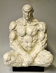 Uhre, Arnt (1954- ) Denmark: A seated man. Sculpture. Painted cement. Mounted on a wooden base. ...