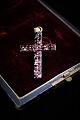 Antique pendant in the form of a crucifix with beautiful red garnets. 4,8x3cm.
