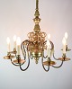 Church 
chandelier with 
eight arms in a 
French style of 
brass from 
around the 
1920s. The lamp 
can ...