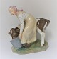 Royal 
Copenhagen. 
Porcelain 
figure. Girl 
with cow in 
colors. Model 
779. Height 16 
cm. (1 
quality).