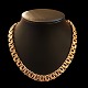 Surel; A heavy 
necklace in 14k 
gold. Clasp 
with two safety 
catches. 
L. 44,3 cm. W. 
10 mm. ...