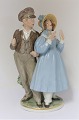 Royal 
Copenhagen. 
Porcelain 
figure. Hans & 
Trine with 
colors. Model 
1783. Height 24 
cm. (1 quality)