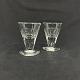 Height 8.5 cm.A pair of finely ground shot glasses in a conical shape with a thick bottom ...