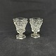 Height 6.4 cm.A pair of shot glasses from the end of the 19th century in pressed ...