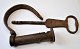 Hand-forged 
iron foot lock, 
baroque, 18th 
century 
Denmark. Iron. 
With 
decorations on 
key. L.: 26 ...