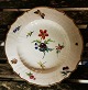 Porcelain plate from approx. 1850 with flower decoration and butterfly and ladybug. In good ...