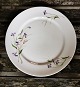 Dinner plate 
with floral 
decoration from 
around 1900. 
Appears to be 
in good 
condition. 
Factory ...