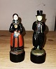 Two figures in painted disco metal from Just Andersen. Both standing on wooden plinths. Factory ...