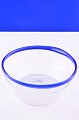 Milk Bowl of 
clear glass 
with blue 
border, height 
9.6cm. diameter 
22.2cm. 3 3/4 
inches. 8 3/4 
...