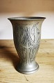 Pewter vase 
with 
decorations on 
two sides. 
Manufactured at 
the Hans Peter 
Hertz workshop 
in ...
