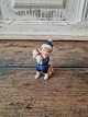 Royal Copenhagen figure - Boy with Christmas presents No. 747, Factory firstHeight 7 cm.