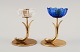 Gunnar Ander for Ystad Metall. Two candlesticks in brass and blue/white art glass shaped like ...