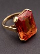 14 carat gold 
ring size 52-53 
with cut topaz 
2 x 1.5 cm. 
from goldsmith 
Svend Nielsen 
Copenhagen ...