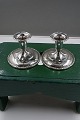 Pair of candlesticks of 830S silver on round filled stand by the Swedish silversmith Schurmann ...