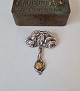 Vintage silver 
brooch in the 
shape of roses 
with amber 
pendant 
Stamped: S.F.- 
830
Dimension 4 x 
...