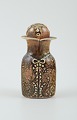 Stig Lindberg (1916-1982), Gustavsberg Studio.Rare bottle vase designed as a man.Plug in the ...