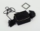 Yves Saint 
Laurent 
shoulder bag in 
suede with 
fringes and 
matching 
make-up mirror.
Late 20 th. 
...