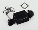 Yves Saint 
Laurent 
shoulder bag in 
suede with 
fringes and 
matching 
make-up mirror.
Late 20 th. 
...