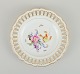 Antique Meissen openwork plate in hand-painted porcelain with flowers and gold 
decoration. Late 19th century.