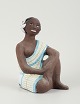 Mari Simmulson 
figure.
Rare ceramic 
figure of a 
semi-naked 
Tahitian woman. 
...