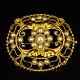 Georg Jensen 
gold jewellery.
Georg Jensen; 
A big oval 
brooch made of 
18k gold set 
with pearls. 
...