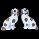 Two English staffordshire dogs, made in white faience with golden decoration. England around ...