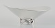 Henning Koppel 
for Georg 
Jensen, 
colossal 
sterling silver 
bowl on 
three-legged 
foot.
Designed ...