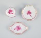 Three small 
Herend "Pink 
Indian" 
porcelain 
pieces with 
hand-painted 
purple flowers 
and gold ...