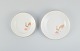 Two rare Art 
Deco Meissen 
plates with 
hand-painted 
peacocks and 
gold ...