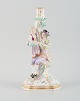 Large antique 
Meissen 
candlestick in 
hand-painted 
porcelain 
decorated with 
flowers, 
insects and ...