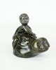 Figure, designed by Just Andersen of Discometal no. D1616 motif of a sea boy on a hippopotamus. ...