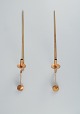 Skultuna, 
Sweden, a pair 
of brass 
candlesticks 
for wall 
hanging.
Designed by 
Pierre Forsell. 
...