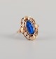 14 carat gold ring adorned with blue semi-precious stones, Danish goldsmith, approx. ...