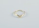Scandinavian goldsmith. Modernist gold ring adorned with brilliant.
Stamped with the goldsmith