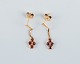Unknown goldsmith, a pair of earrings adorned with semi-precious stones.Unmarked.Measured at ...