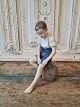B&G Figure - 
Boy sitting on 
a stone 
No. 1757, 
Factory first 
Height 20 cm. 
Design: 
Ingeborg ...
