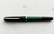 Green Pelikan fountain pen with black cap. Made in Germany in the 1970s. Pistol filler. Appears ...