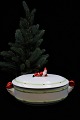 Old 
hand-painted 
oval Christmas 
terrine in 
porcelain with 
elves from 
Gustafsberg. 
H:13cm. 
27x16cm.