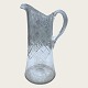 Sneglehank's 
jug with 
grindings, 21cm 
high, 14cm in 
diameter *With 
small bubbles 
in the glass*