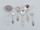 A collection of 6 pieces of various silver and new silver.
Sandwich tong, spoons and more.