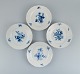 Four antique Meissen dinner plates.
Hand painted with various blue flowers and butterflies.