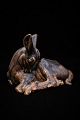 Saxbo ceramic 
figure of a 
reclining deer 
with fine brown 
glaze.
Design Hugo 
Liisberg. H:14 
cm. ...