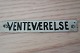 A little signboard made of enamelText: Venteværelse ( Waiting room)In a  good ...