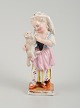 Meissen similar 
stamp, girl 
with lamb, late 
19th century.
In great 
condition.
Marked.
First ...