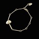 Georg Jensen. 
18k Gold 
Bracelet #1445 
- Pebbles.
Designed by 
Lina 
Falkesgaard.
Stamped with 
...