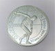 Cook Islands. 
Olympiad 2004. 
Silver coin $10 
from 2001. 
Diameter 38 mm.