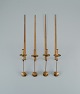Skultuna, Sweden, four brass candlesticks for wall hanging.Designer by Pierre Forsell. ...