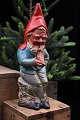 Old Santa Claus 
with small bird 
in terracotta. 
Height: 25cm.